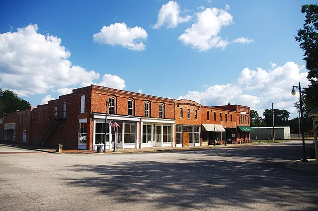 Buildings along College Street on the Town Square in Courtland, Alabama, United States. These buildings are listed on the National Register of Historic Places as contributing prop...