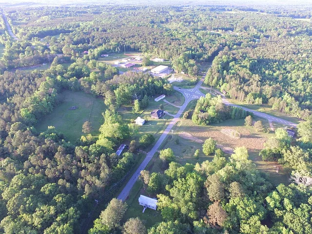 Aerial view of Forkland, Alabama, facing north to northeast, showing the intersection of U.S. Route 43, Lloyd Chapel Road, and A. L. Isaac Road. St. John's Episcopal Church is nea...