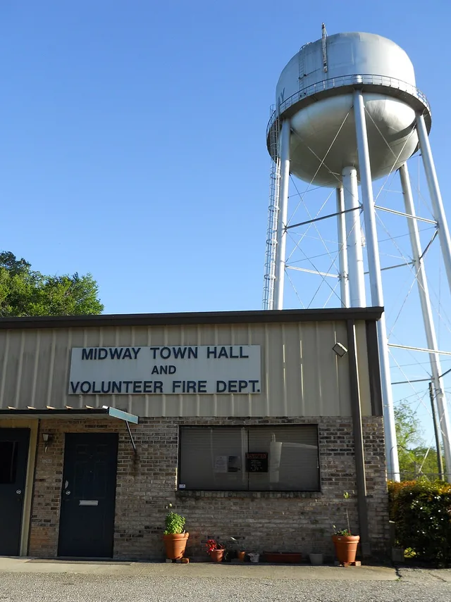This is a photograph of the town hall and fire department of Midway, Alabama