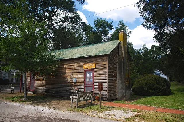 Post office in Mooresville, Alabama, United States. This building is listed on the National Register of Historic Places as a contributing property in the Mooresville Historic Dist...