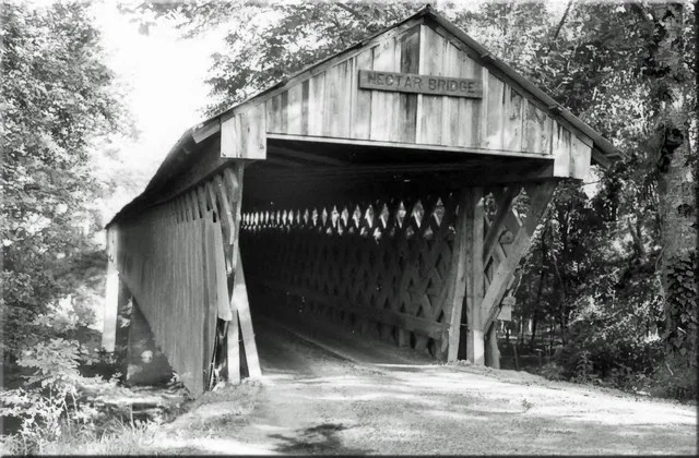 An old photo of the Nectar Covered Bridge.