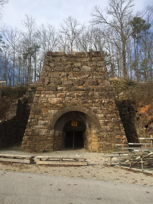 The remaining stone structure of the blast furnace at Janney Furnace Park in Ohatchee, Alabama .