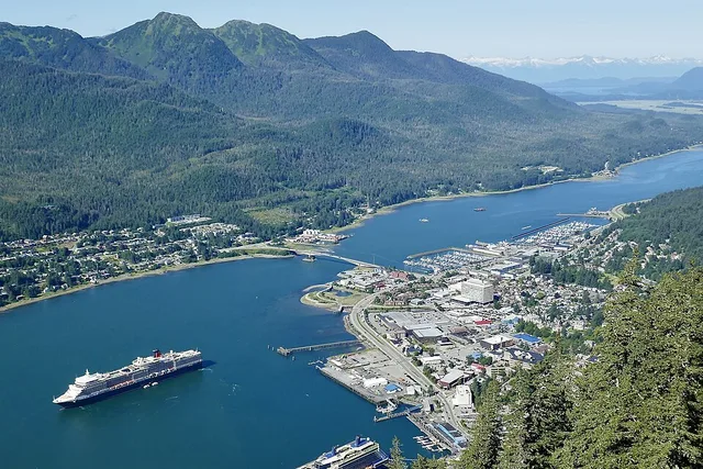 MS Queen Elizabeth in Juneau, Alaska on 15 August 2024. Downtown Juneau at right.