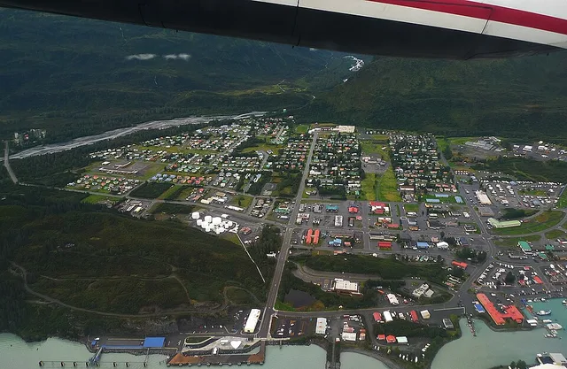 Aerial view of the main townsite of Valdez, Alaska , cropped to remove most of the airplane prop/wing and sparsely populated areas on the townsite's outskirts.