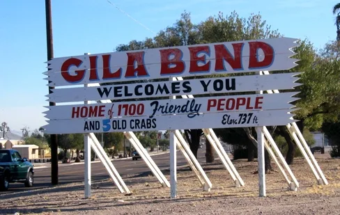 A humorous, numerically outdated sign welcomes people to Gila Bend, Arizona . Photo by Karen Funk Blocher, December 2005.