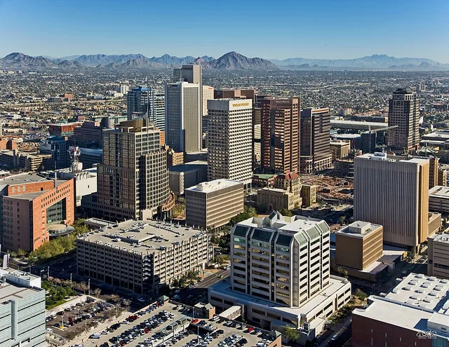 Skyline view of Phoenix — looking northeast from a helicopter, from above the 4th Avenue Jail. Foreground is the Central City Village and Central Avenue Corridor of Downtown Phoen...