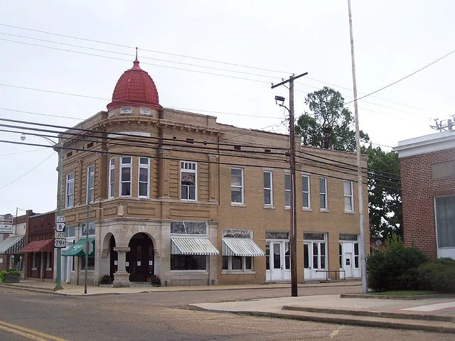 From flickr: This insurance building in downtown Fordyce now contains a steak house....I love those Spanish revival details.