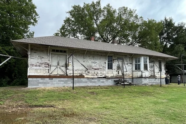 The Rock Island Railroad Depot at Perry, Arkansas on July 15, 2023. It had been placed on a cinder block foundation and the roof replaced by this point. The next step in the resto...
