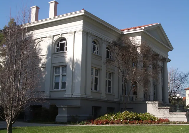 The Carnegie Library, located at the west end of Marston Quadrangle at Pomona College . The library houses the college's politics and economics departments.