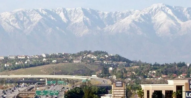 A View of Corona, California , view looking north-northwest. The Interstate 15 and California State Route 91 interchange is picture in the foreground (bottom left corner) while th...