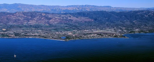 Aerial photo of the Goleta area, Santa Barbara County, California—from offshore. From the left: Ellwood area, Coal Oil Point and Devereux Slough area, Isla Vista and UCSB to Campu...