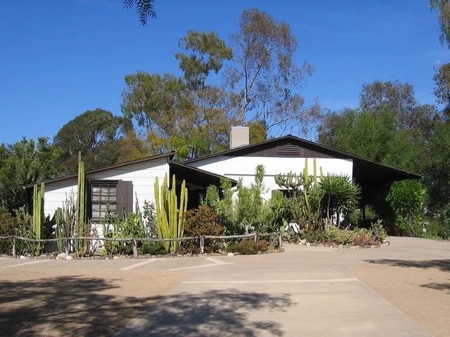 An exterior view of the Serrano Adobe facing northeast.