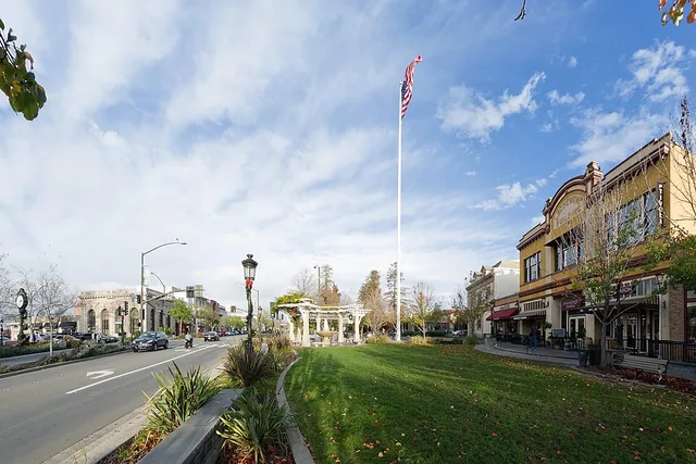 The flagpole in downtown Livermore, California has been a community landmark since 1905. The Howard replica clock (c. 1900) on the left was installed in 1995 as a memorial for Rob...