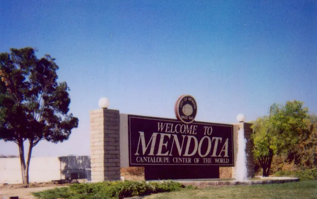 Documentary snapshot of welcome sign at south port of entry to Mendota . Polaroid snapshot image taken in 2006. Photo by David Jordan. Please credit the photographer when using th...