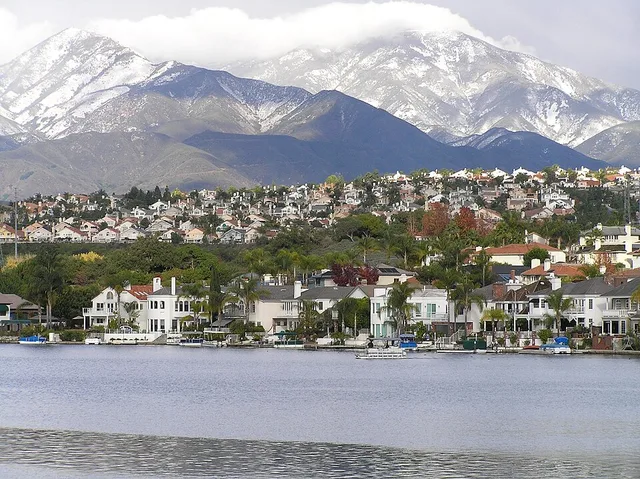 Saddleback Mountain unusually covered in snow over Lake Mission Viejo.