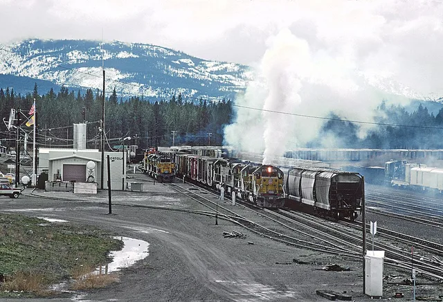 Union Pacific SD40-2 3579, SD40-2 3760, C30-7 2400, and DDA40X 6943 Portola, CA in November 1984. A Roger Puta Photograph