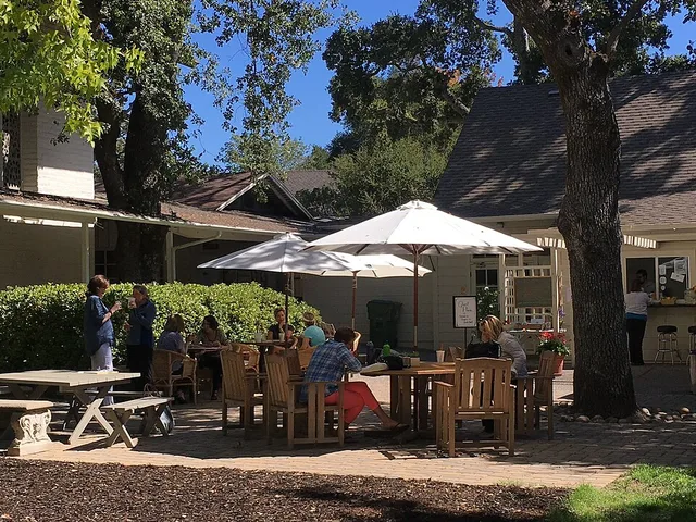 The Village Hub in Downtown Woodside, behind the Village Church and next to the Woodside Library.