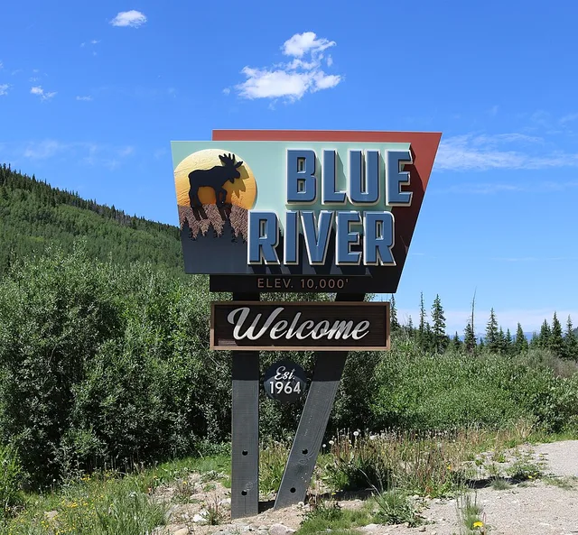 A welcome sign for the town of Blue River, Colorado . The sign is located along Colorado State Highway 9 at the southern entrance to the town.
