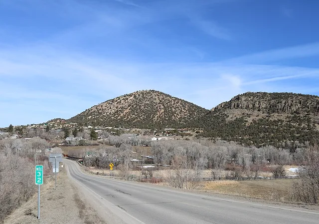 The town of Crawford, Colorado, in Delta County. The symmetrical mountain on the left is Youngs Peak.