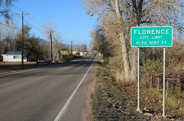 A city-limit sign marking the entrance to Florence, Colorado , in Fremont County. The road is Colorado State Highway 115 , which is East Main Street in Florence.