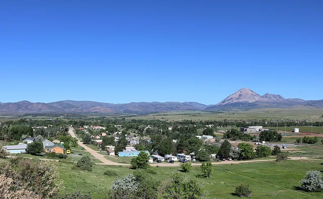 A view of the town of La Veta, Colorado from a point east of the town. The mountain on the right is Mount Mestas .