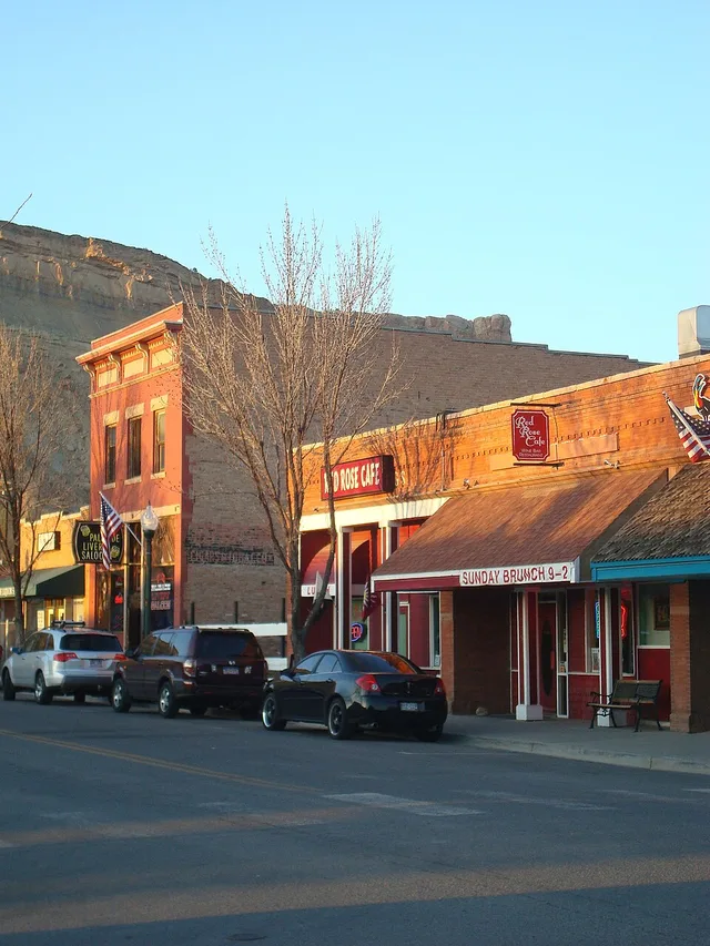 Sun sets on the Bookcliffs and Main Street Palisade, Colorado, United States