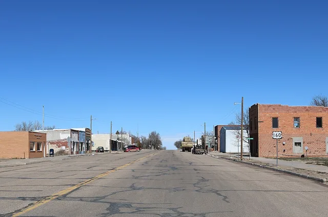 A view of Pritchett, Colorado. The view is towards the north along Randolph Street, which is also the town's main street, and it is also U.S. Route 160.