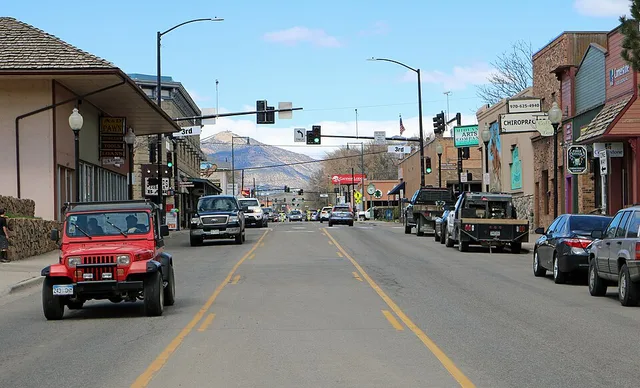 A view of Railroad Avenue in Rifle, Colorado . The view is to the north, and part of the Grand Hogback is seen in the distance.