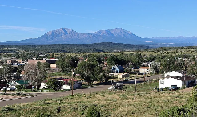 A view of Walsenburg, Colorado and the Spanish Peaks . The Culebra Range is visible on the right.