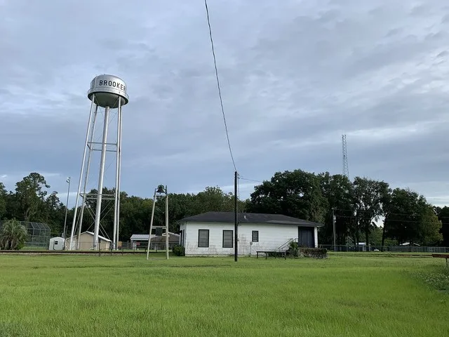 Old train station and water tower in Brooker, Florida.