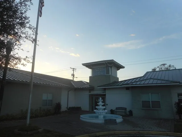 Images related to the Dundee Town Hall and Library on the southeast corner of Main Street and Center Street (both of which are part of Florida State Scenic Road 17) in Dundee, Flo...
