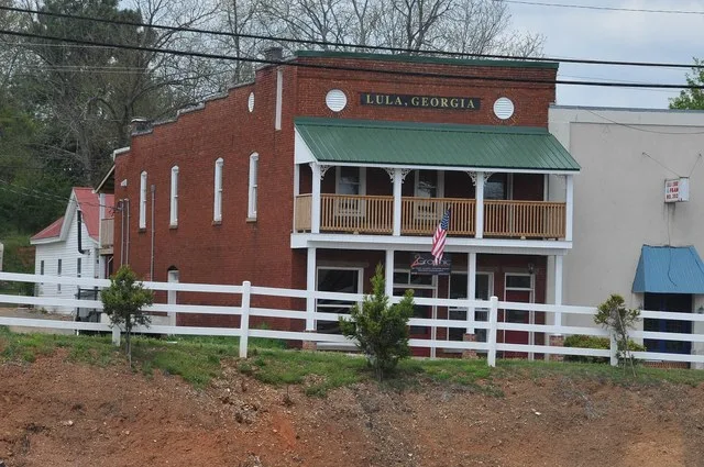 INTERESTING COMMERCIAL STORE ON MAIN STREET WITH "LULA GEORGIA" AT THE TOP