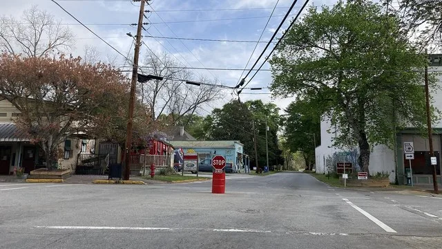 Rutledge, Georgia downtown intersection 55 gallon oil drum stop sign.