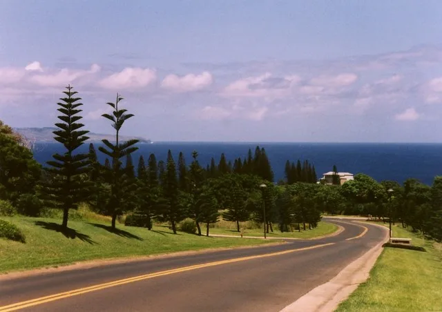 Subject: Maui in foreground, the ocean, and then a view of Molokai's eastern edge Date: Circa 1989 Place: From the top of Office Road (at Hwy 30), Kapalua, Maui, Hawaii - Facing n...