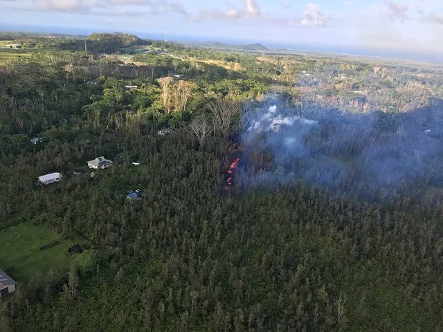 An eruption has commenced in the Leilani Estates subdivision in the lower East Rift Zone of Kīlauea Volcano. White, hot vapor and blue fume emanated from an area of cracking in th...