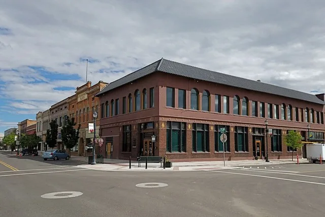 The corner of South Seventh Avenue and Main Street, looking southwest, showing the Commercial Building in Caldwell, Idaho, designed by Tourtellotte and Hummel and listed as site #...