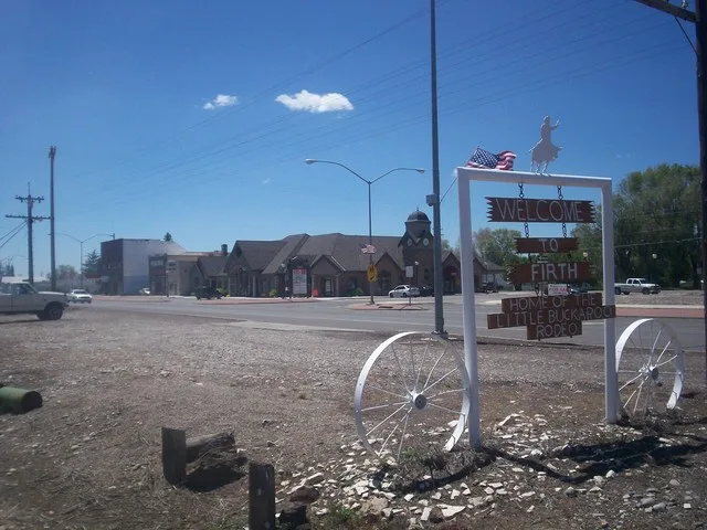 The welcome sign in Firth Idaho. The sign advertises the Little Buckaroo Rodeo, which is a rodeo for children.
