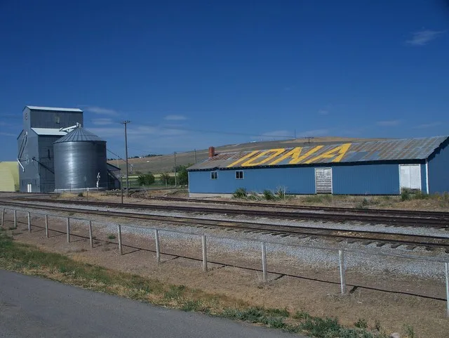Grain elevator along a train stop in Iona, Idaho .