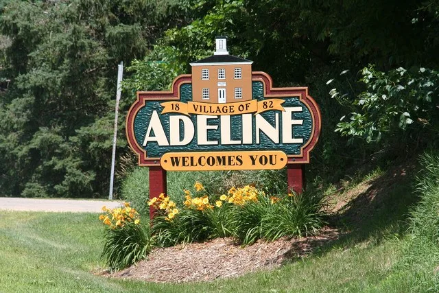 Picture of the sign leading into the south side of Adeline, Illinois, USA.