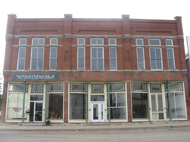 Front of the Alexis Opera House , located at 101-105 N. Main Street in Alexis , Illinois , United States . Built in 1889, it is listed on the National Register of Historic Places .