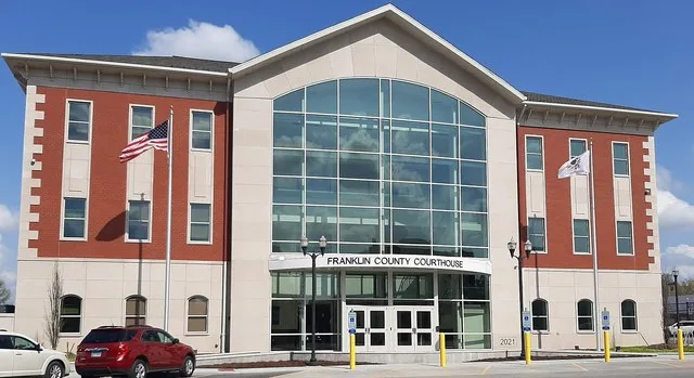This photograph was taken of the side of the courthouse that faces west at 3:46 PM Central Daylight Time (CDT). This side of the courthouse would be the "front" side of the courth...