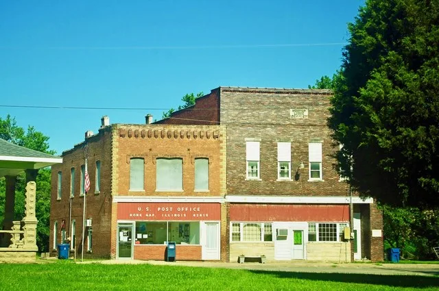 Post office (left) and Independent Order of Odd Fellows (I.O.O.F) Monitor Lodge No. 235 building in Bone Gap, Illinois, United States.
