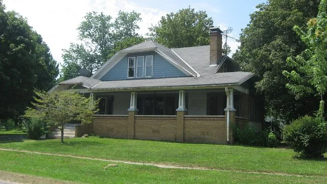 Front of the Floyd and Glenora Dycus House , located at 305 S. Second Street in Brownstown , Illinois , United States . Built in 1933, it is listed on the National Register of His...