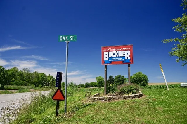 Welcome sign along State Street (Illinois Route 14) in Buckner, Illinois, United States.