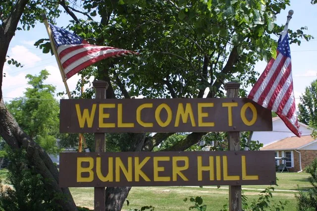 Bunker Hill Welcome Sign entering the town from the west on the Bunker Hill-Brighton Road.