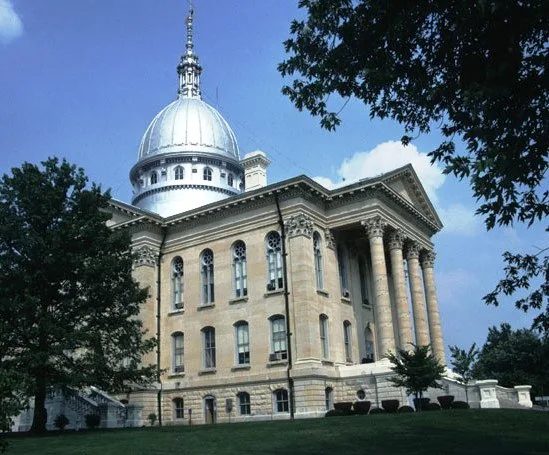 Exterior of the Macoupin County Courthouse , located along Illinois Routes 4 / 108 in Carlinville , Illinois , United States . Built in 1870, it is part of the Carlinville Histori...