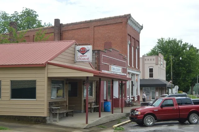 Buildings on the eastern side of Main Street, just south of the courthouse , in central Elizabethtown , Illinois , United States .