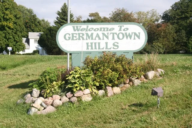 The welcome sign into Germantown Hills , Illinois on Illinois State Route 116 . South side of road coming from the west.