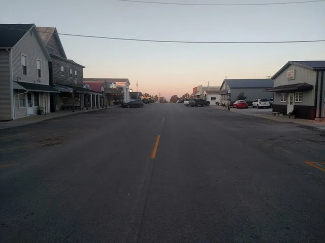 A picture of Gifford, Illinois' main street at sunset.