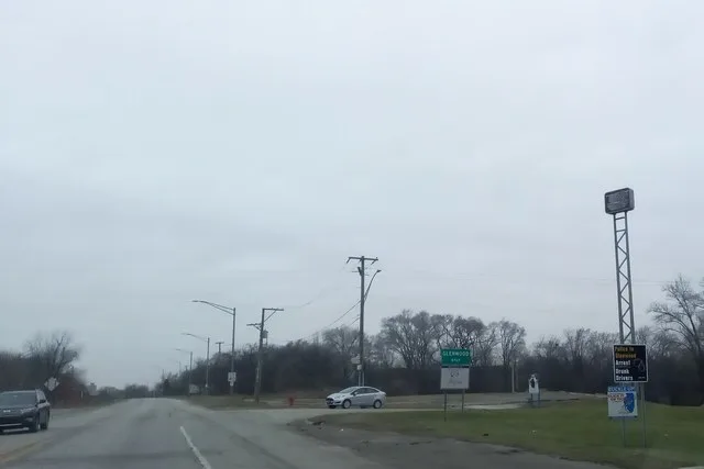 Glenwood village limit sign at westbound Glenwood-Dyer Road